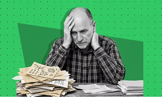 A black-and-white man surrounded by a mountain of papers against a textured green background. It perfectly captures cognitive load or burnout.